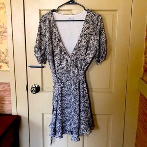 GillI wrap mini dress with ruffle hem short sleeve